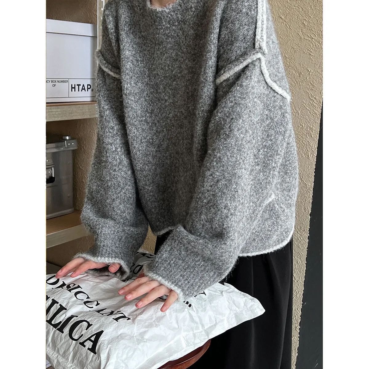 Loose Contrast Color Asymmetric Hem Sweater