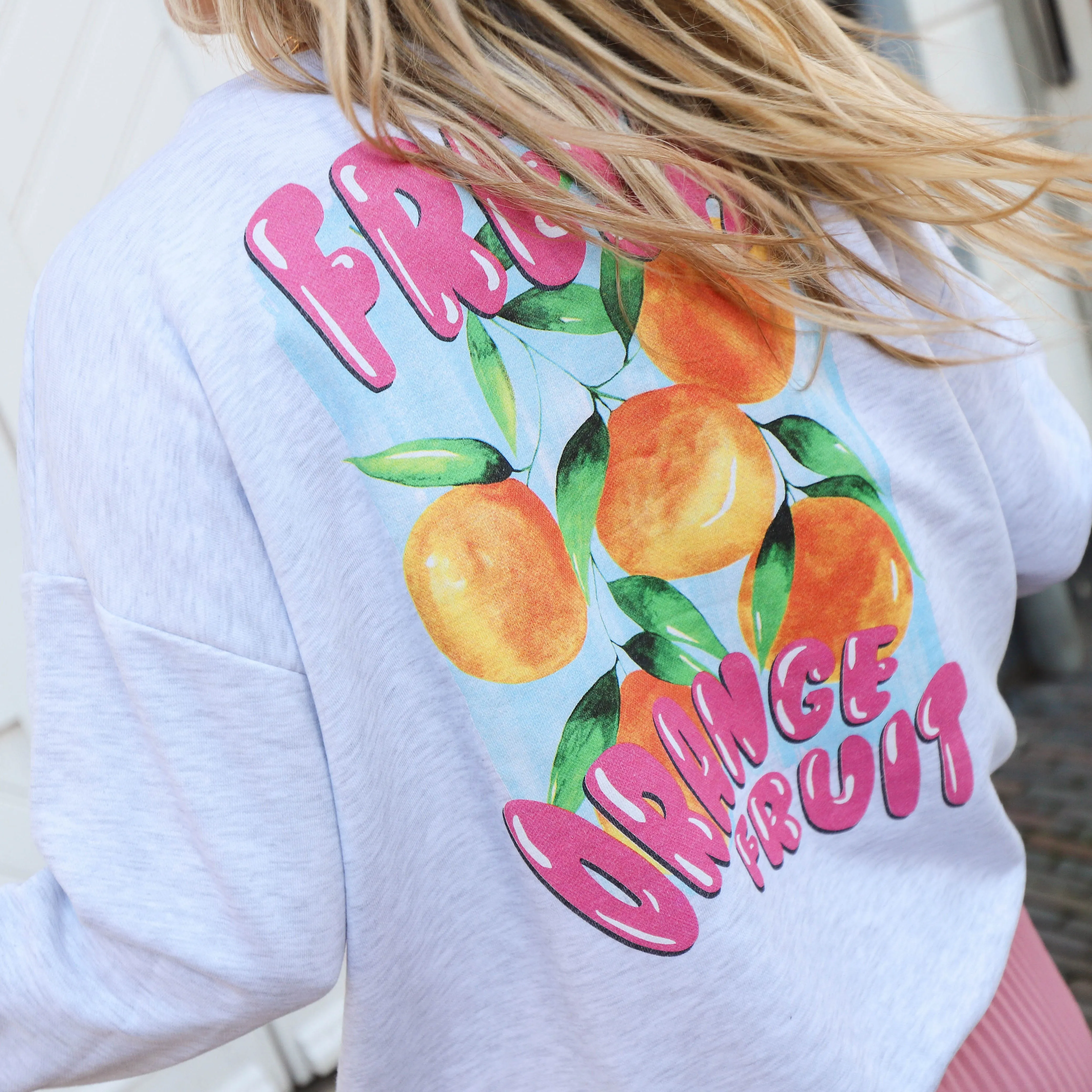 Orange sweater light grey